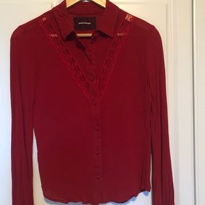 Reformation crimson blouse with lace insert.